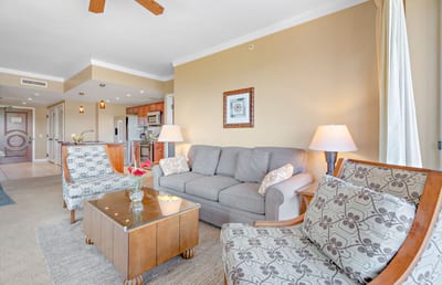 Spacious island retreat with warm tones, modern kitchen, and cozy charm.