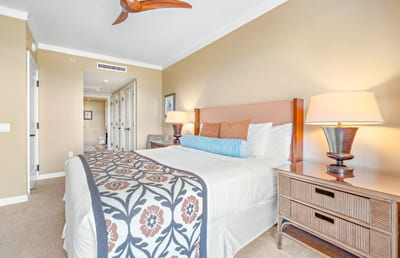 Tranquil bedroom sanctuary with tropical accents and plush, inviting comfort.