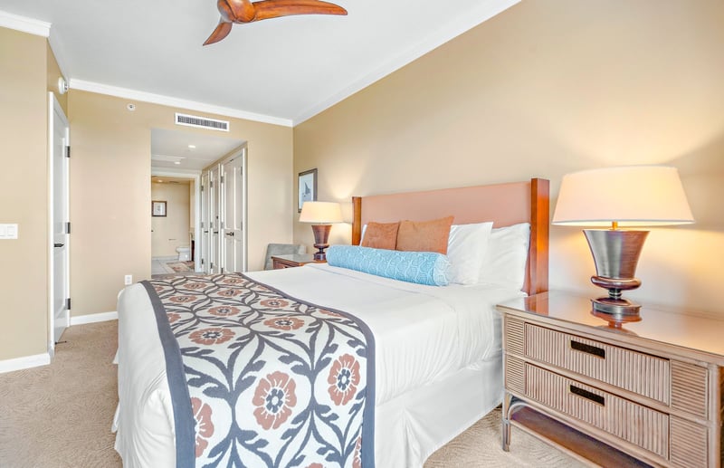 Tranquil bedroom sanctuary with tropical accents and plush, inviting comfort. HKK-820