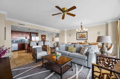 Spacious living area flows into dining, with warm tones and plenty of natural light. HKK-825