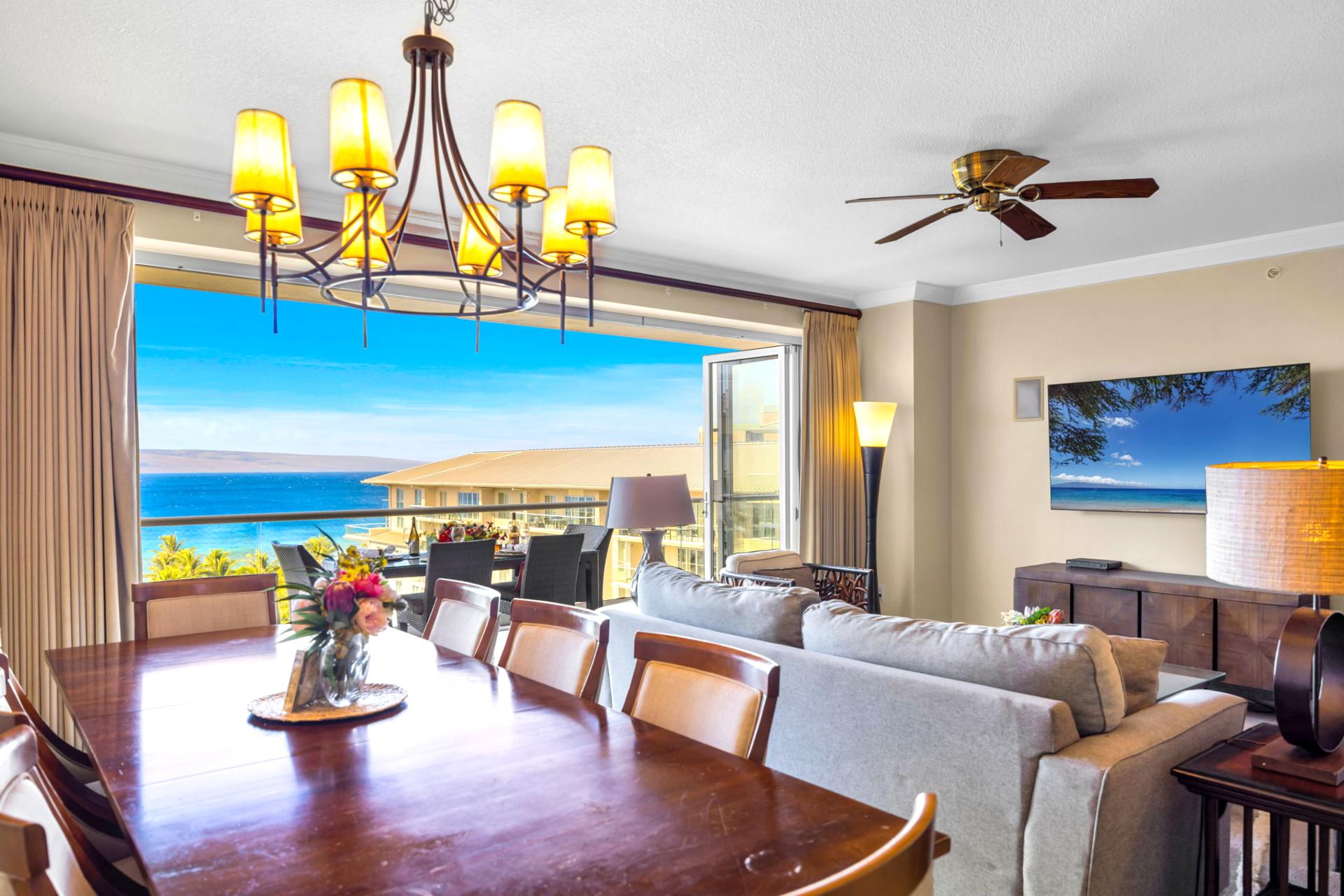 Dining table for six with ocean glimpses and elegant lighting for easy in-home meals.