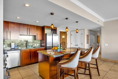 Gourmet kitchen with bar seating and top-tier appliances for effortless vacation meals. HKK-825