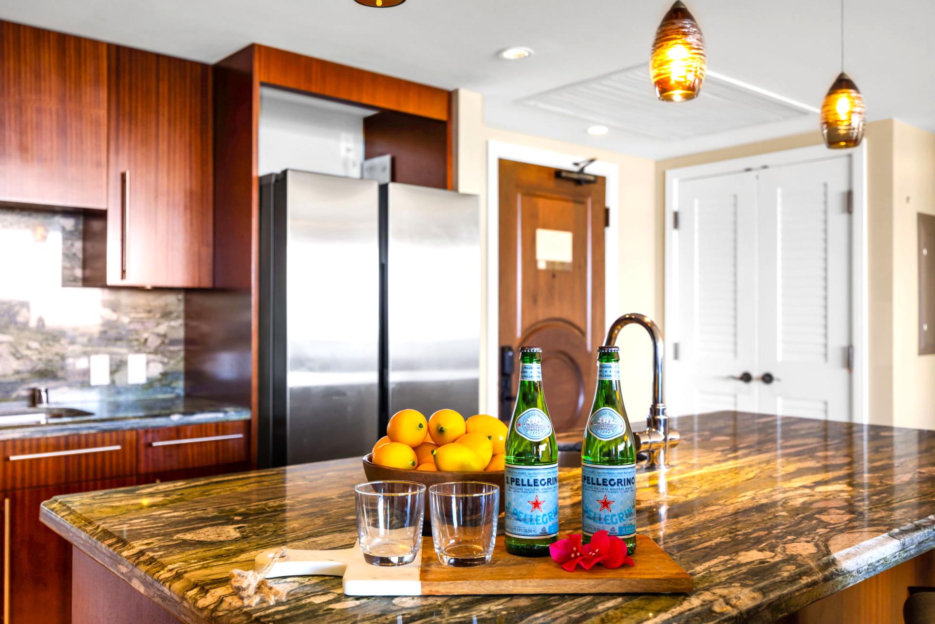 Full kitchen with granite island, stainless appliances, and plenty of space to cook and gather.