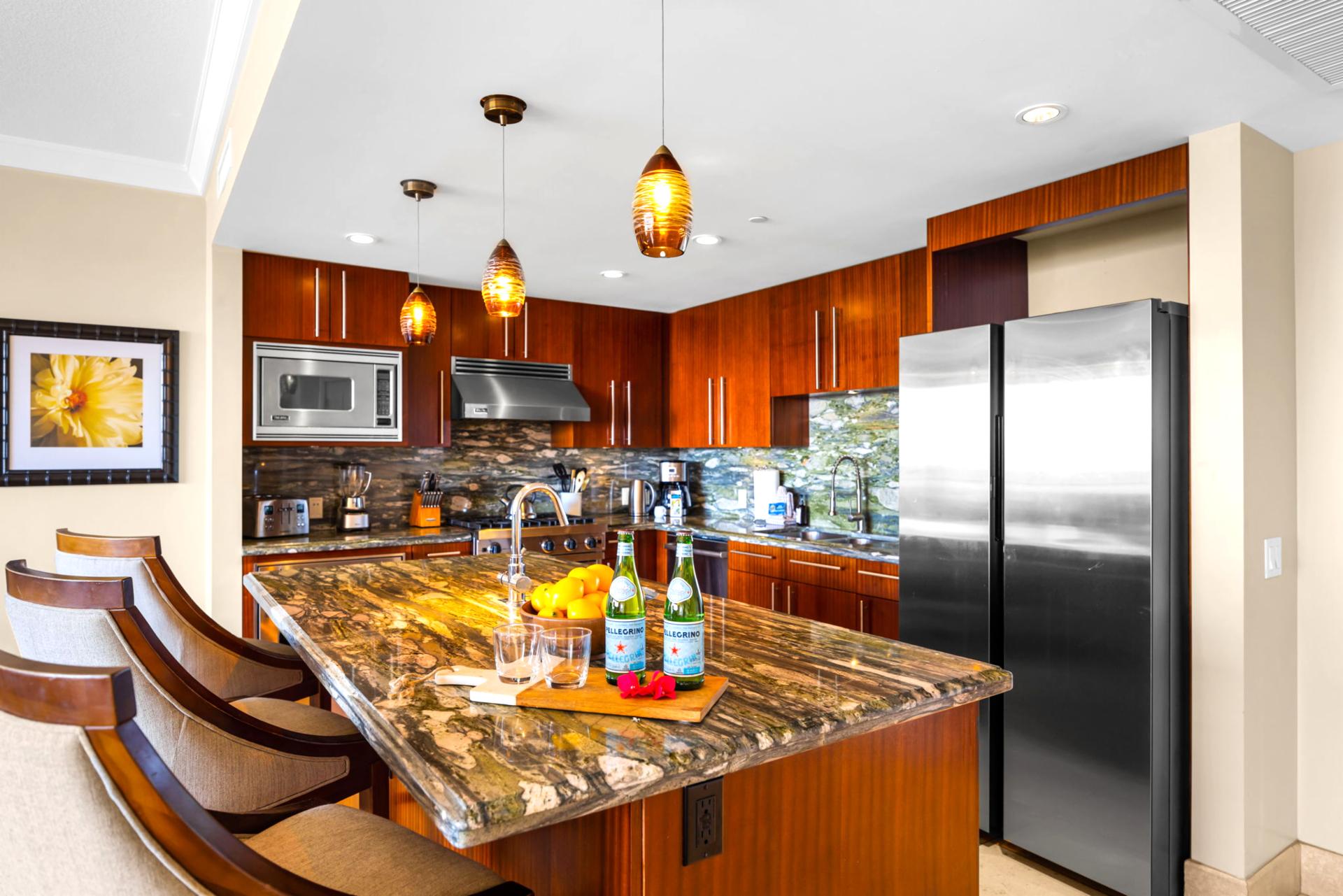 Open-concept kitchen with dual ovens and generous prep space for at-home cooking ease.