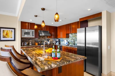 Open-concept kitchen with dual ovens and generous prep space for at-home cooking ease. HKK-825