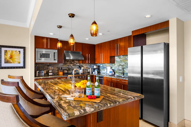 Open-concept kitchen with dual ovens and generous prep space for at-home cooking ease.