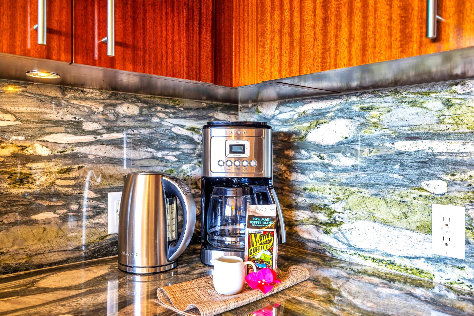 Coffee bar and granite counters highlight the fully equipped kitchen’s thoughtful layout.
