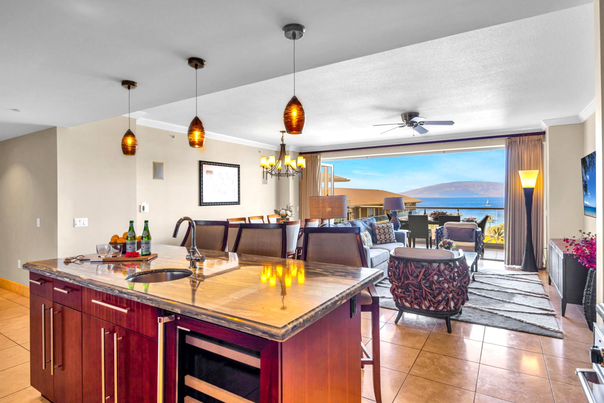 Kitchen opens to dining and living areas for seamless entertaining and together time.
