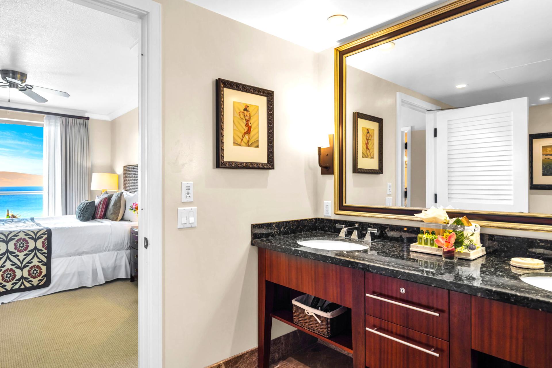 Second guest bathroom with polished finishes and full vanity.