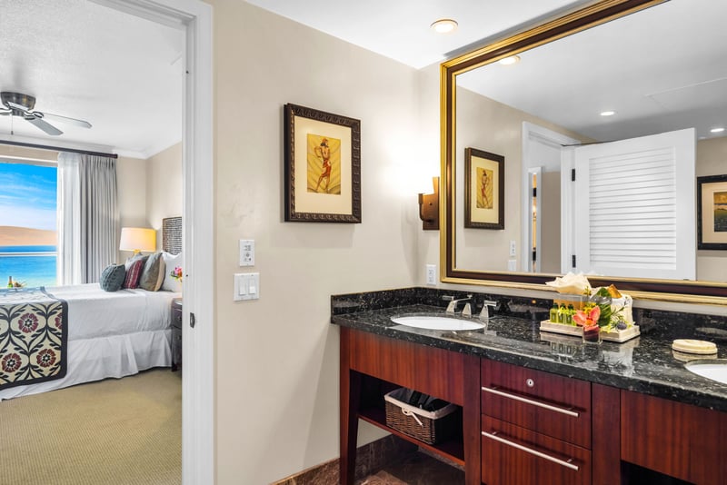 Second guest bathroom with polished finishes and full vanity.
