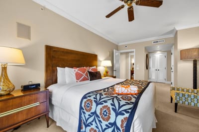 Spacious guest room with King bed and neutral tones for a relaxing stay. HKK-825