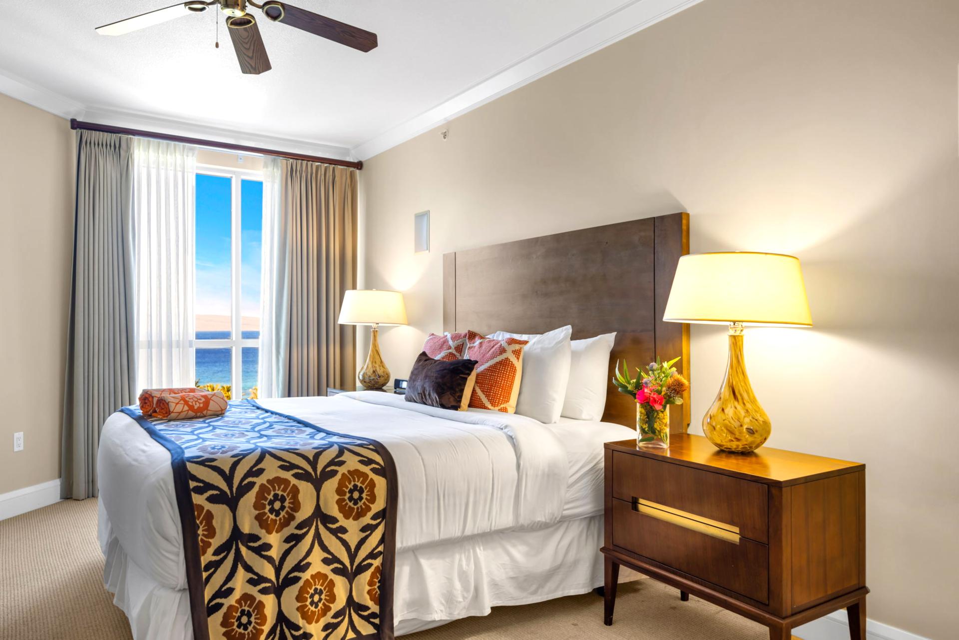 Guest bedroom with King bed and soft neutral palette for peaceful sleep.