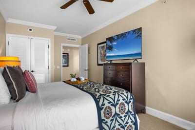 King bed and mounted Smart TV make this primary suite perfect for movie nights. HKK-825