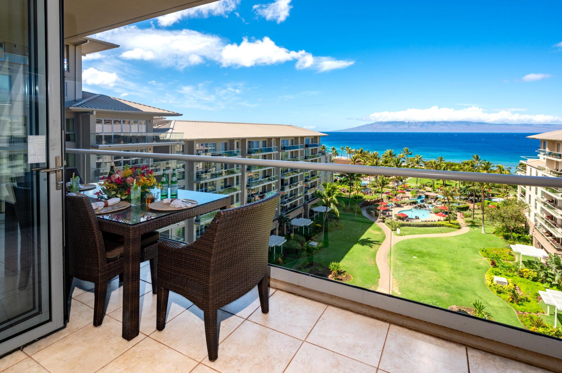 Take in sweeping views of the Pacific and Molokai from your private lanai at Honua Kai, with a shaded dining table perfect for al fresco meals.