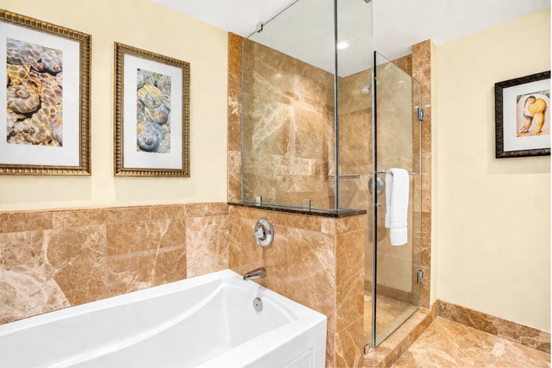 The Master Bath includes a soaking tub and walk in shower, giving you options to refresh or unwind after beach days.