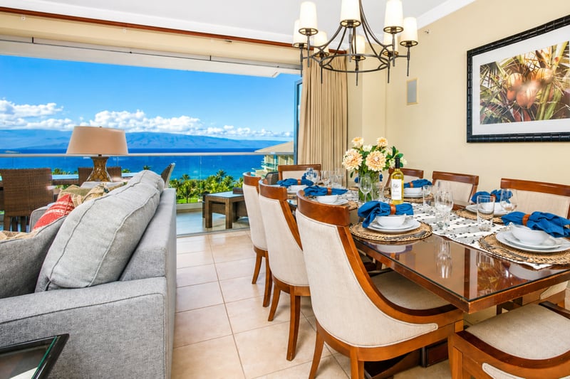 A large dining table sits beside ocean views, giving you a scenic setting for shared meals and memorable conversations.