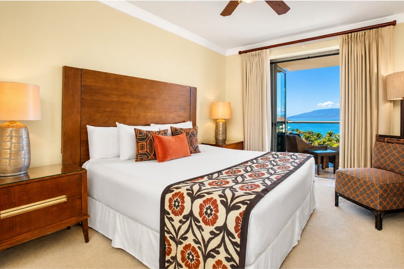 Another view of your Master Bedroom highlights plush bedding and direct access to natural light and calming interiors.