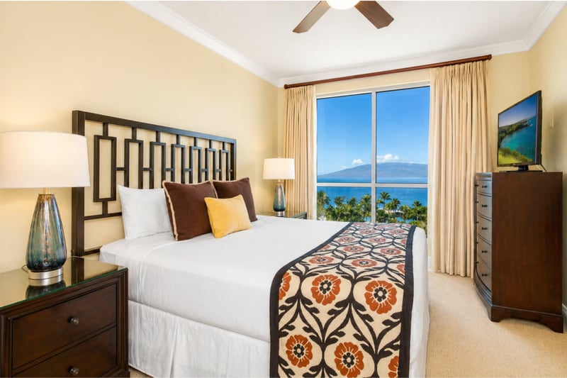 Second guest bedroom provides cozy sleeping arrangements and island inspired touches for a relaxing stay.