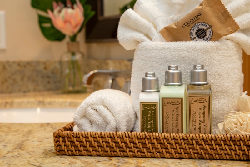 Luxurious L’Occitane toiletries and plush towels for pampered guest experience. HKK-920