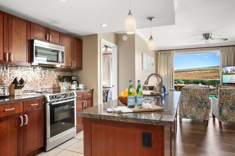 Stylish kitchen island with refreshments and stunning mountain view beyond. HKK-920