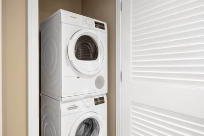 In-suite Bosch washer and dryer for convenient guest laundry needs.