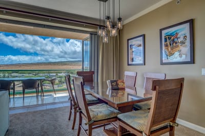 Elegant dining with scenic views and warm island-inspired ambiance.