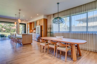 Dine in style under soft natural light and island-inspired design