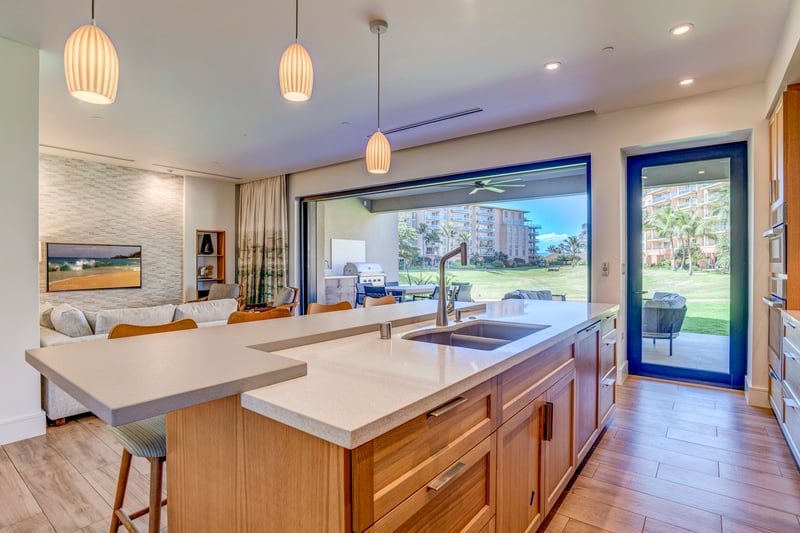 Your own spacious kitchen with breakfast bar, open layout, and island breezes