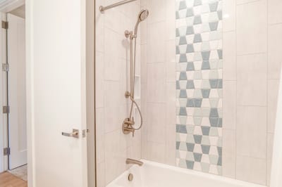Bright bathroom shower with sleek modern fixtures
