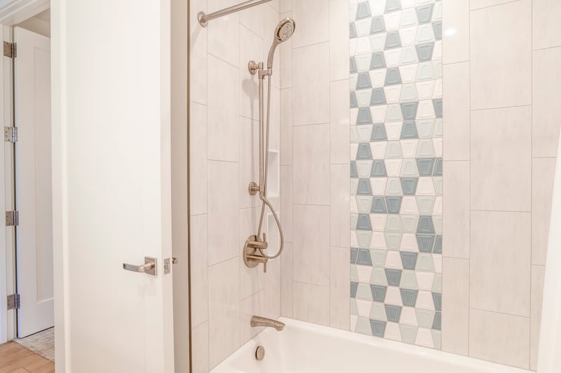 Bright bathroom shower with sleek modern fixtures