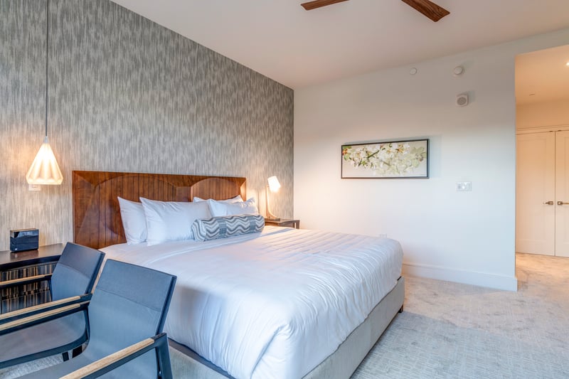 Plush bedding and natural lighting makes afternoon naps a breeze