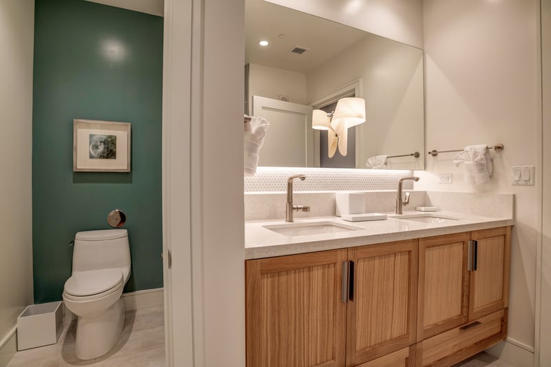 Inviting guest bath with modern fixtures and upgraded natural wood cabinetry