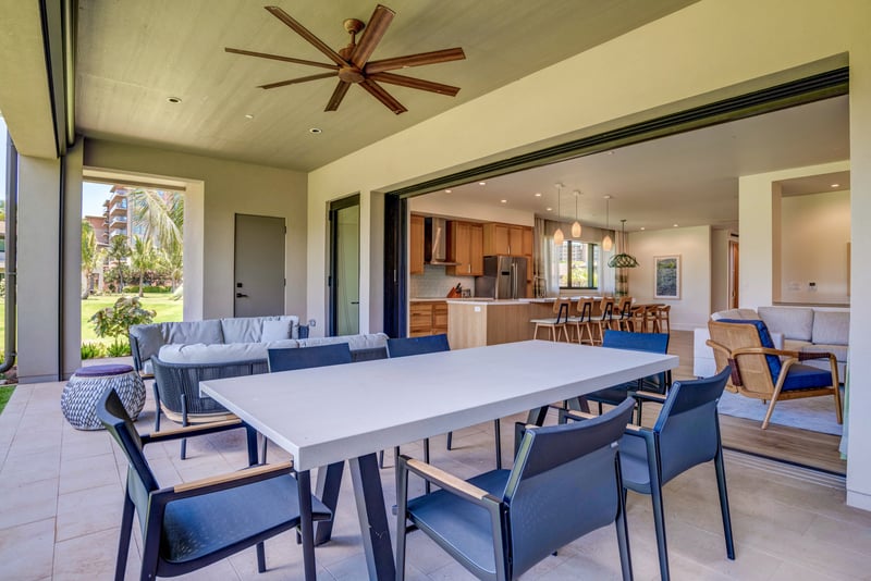 Spacious patio dining with seamless indoor-outdoor island living design