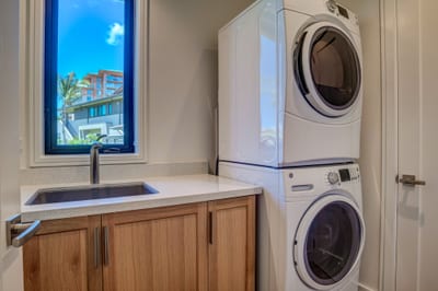 In unit laundry for easy beach clean up and vacation attire refresh