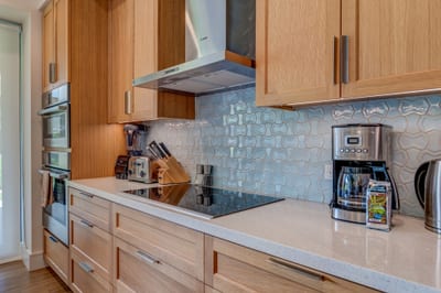 A clean design with warm wood tones — your dream kitchen awaits