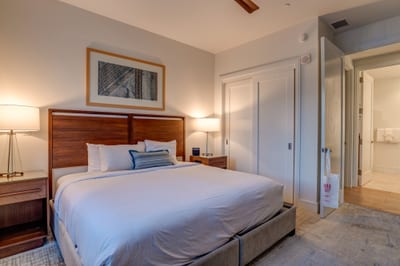 King suite with soft lighting and luxury finishes for ultimate relaxation