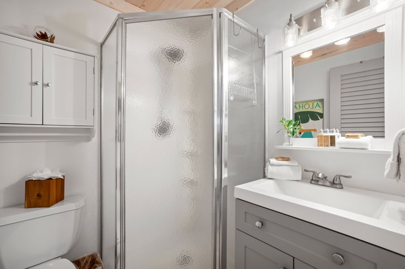 Small but mighty, this bathroom is stocked and styled with everything you need to rinse, refresh, and rejuvenate