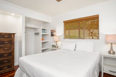 With glowing wood floors and tropical sunlight, this room wraps you in comfort and whispers stories of aloha nights