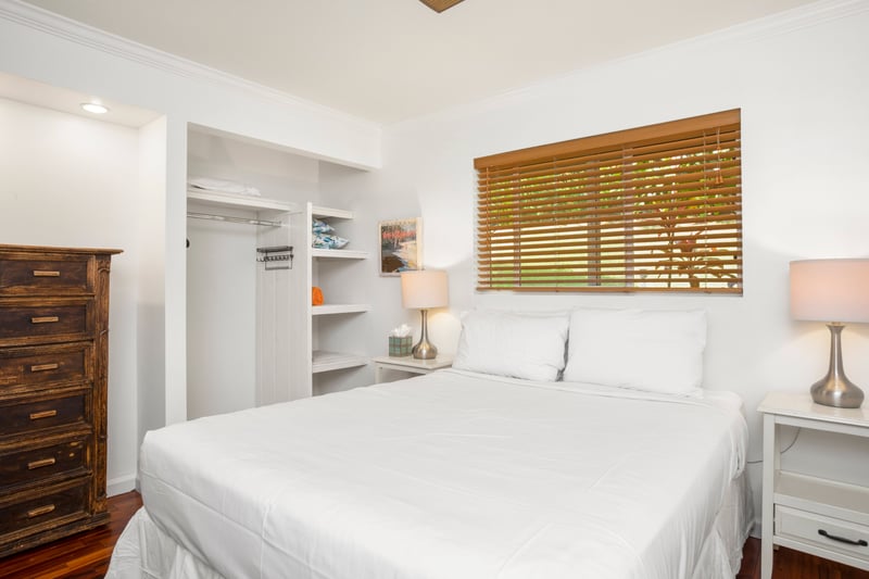 With glowing wood floors and tropical sunlight, this room wraps you in comfort and whispers stories of aloha nights