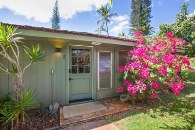 Tucked beneath palms and blooming colors, this charming retreat invites peaceful mornings and slow, sunny strolls