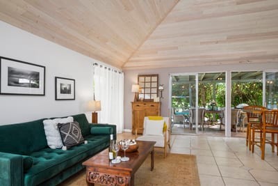 Slide into island time surrounded by artful touches, woven textures, and golden light that dances at dusk