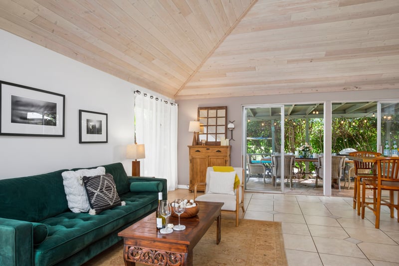 Slide into island time surrounded by artful touches, woven textures, and golden light that dances at dusk