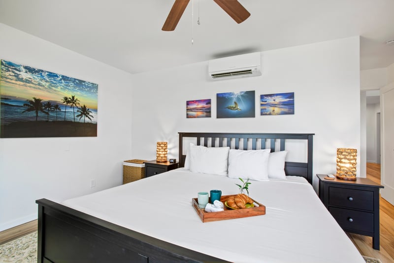 Drift into island dreams in this elegant and airy bedroom oasis.