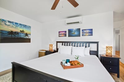 Drift into island dreams in this elegant and airy bedroom oasis.