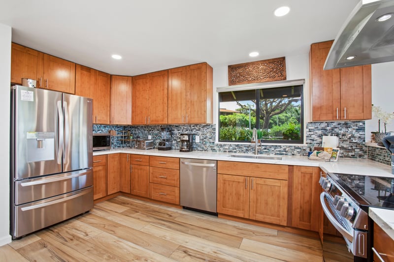 Create, connect, and share in this open-concept kitchen.