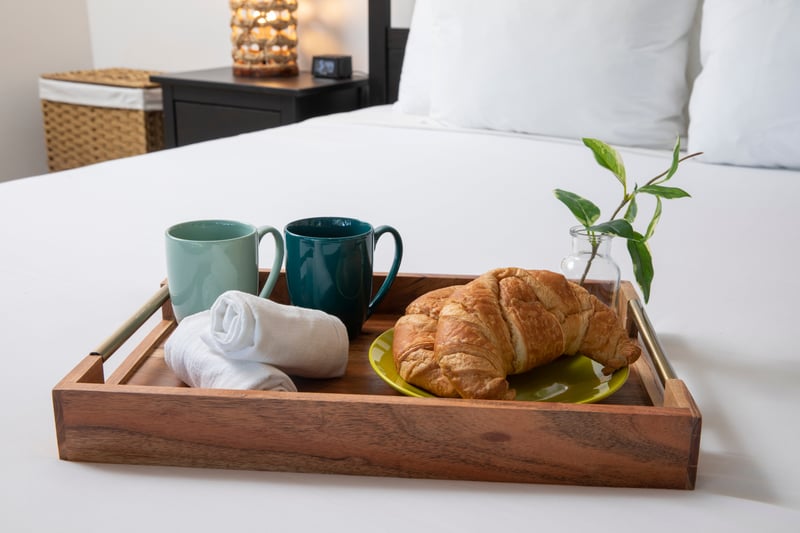 Waking up in paradise never tasted so good — breakfast in bed with an ocean breeze.