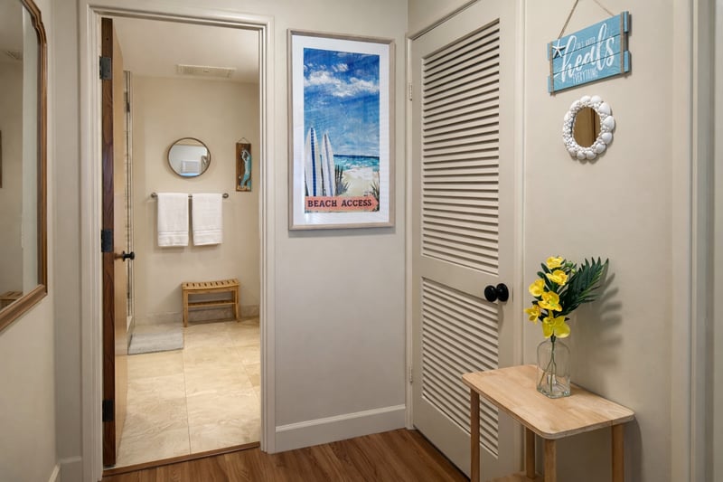 Unwind in the private bathroom off the primary suite after a day on the beach