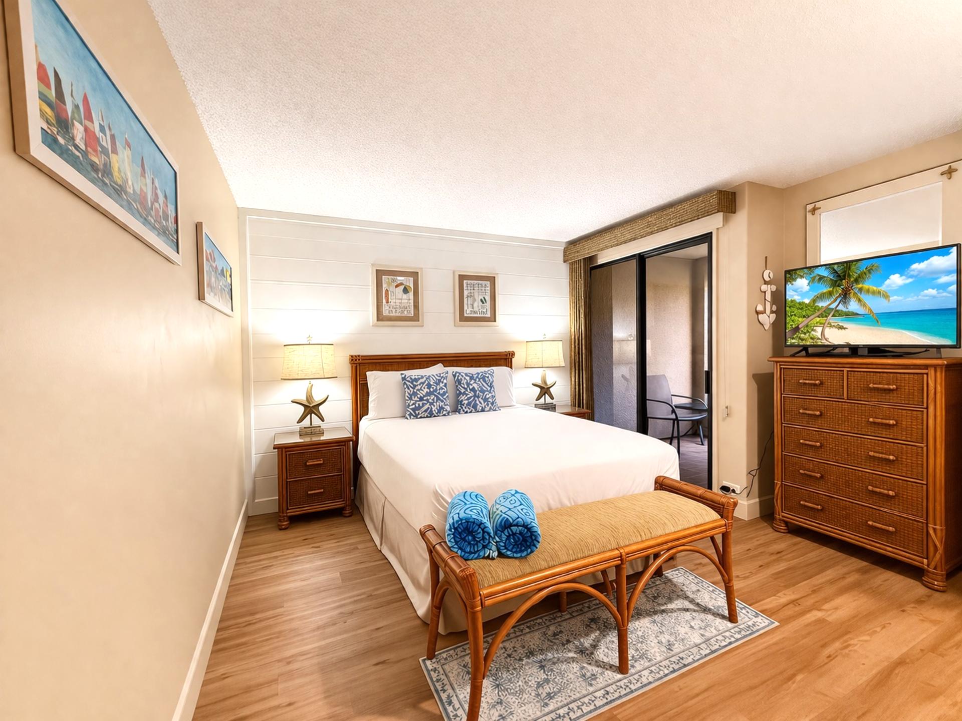 The guest bedroom features a comfortable queen size bed and premium linens