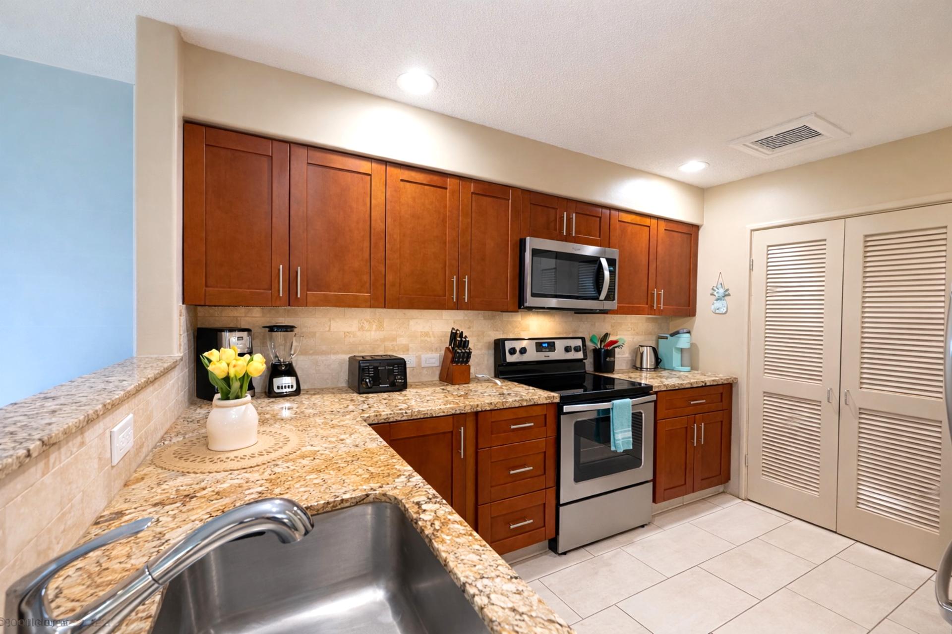 A bright and updated kitchen is the perfect place to prep meals 