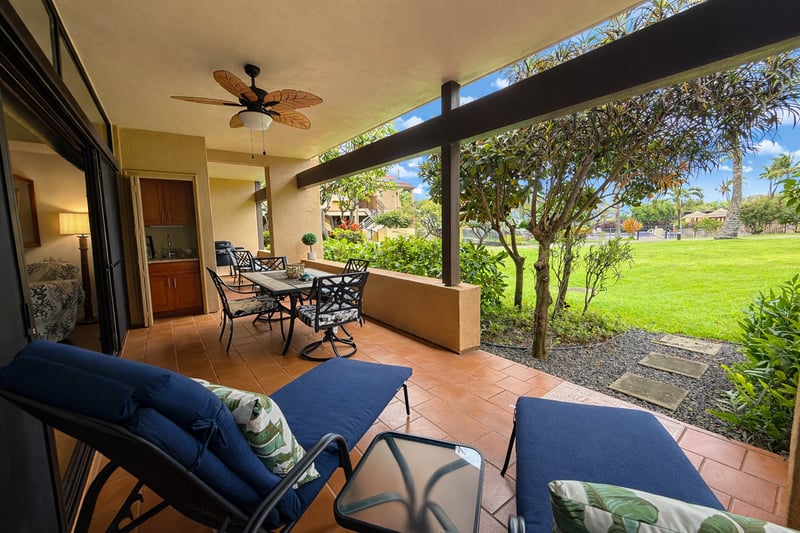 The spacious lanai features a bbq, separate sink for added convenience, and ample furniture for lounging and dining